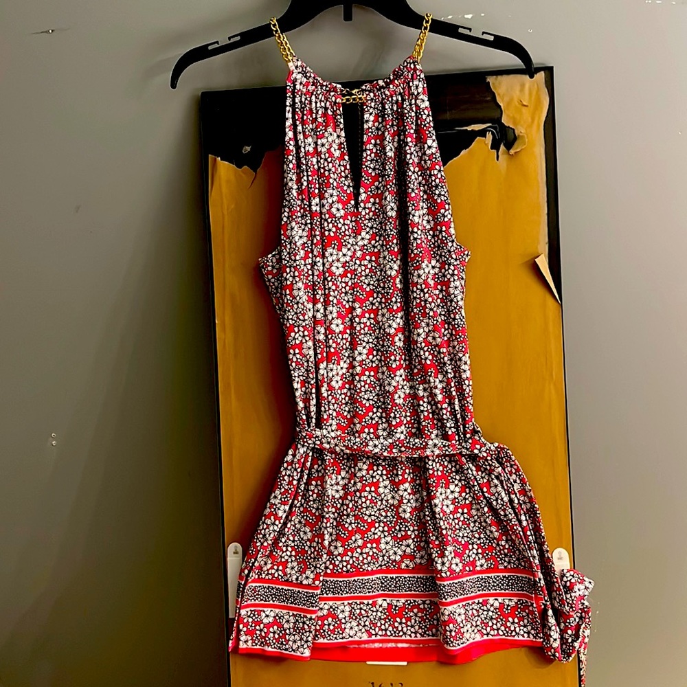 Top open shoulder, gold chain neckline, Michael Kors dangle down the back.